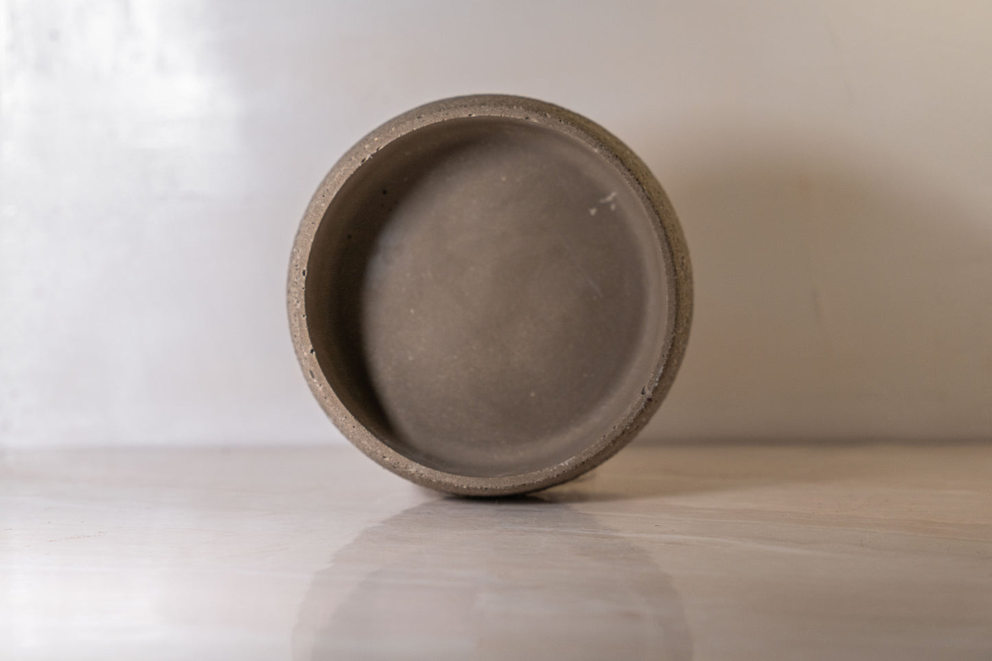 Vasoio svuota tasche rotondo